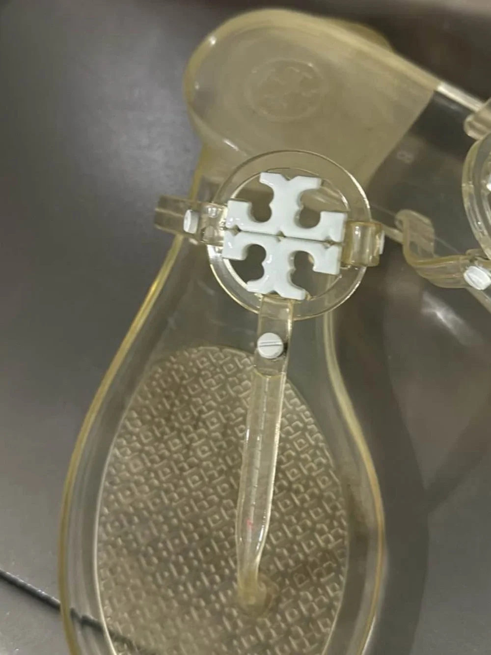 Tory Burch Translucent Jelly Thong Sandals with White Logo Medallions